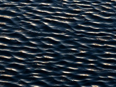 Water ripples symbolizing flow and movement